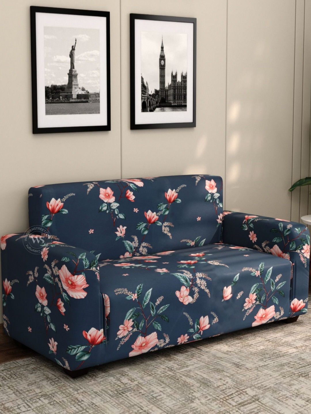 

WOODEN STREET Flaubert Blue & Peach Colored Floral Printed 2 Seater Sofa Cover