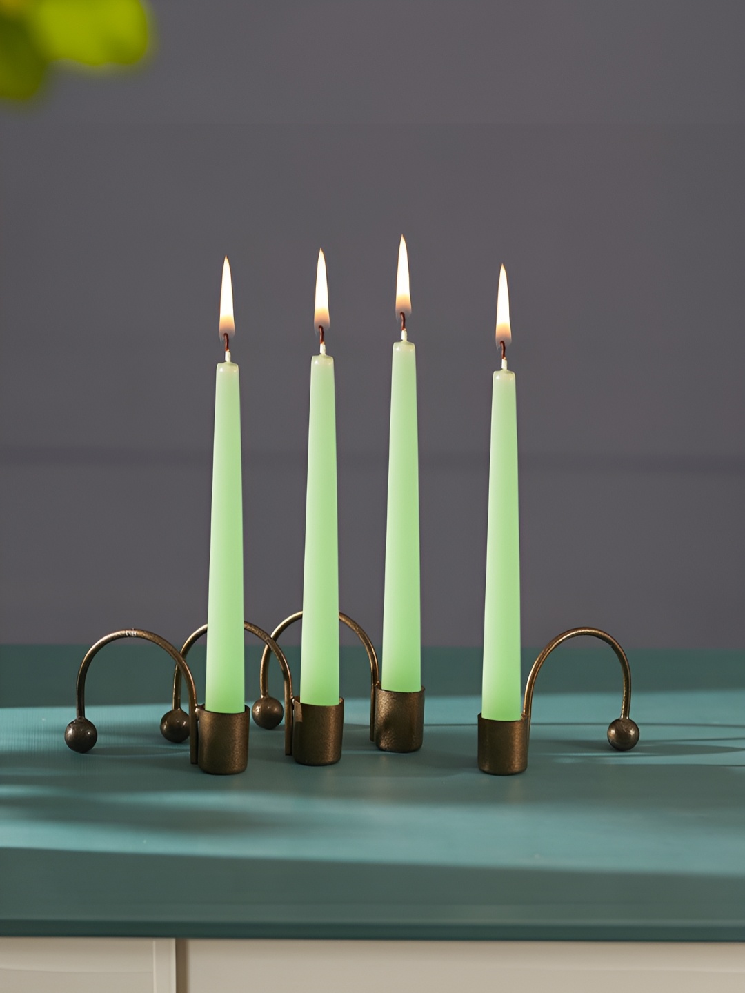 

Homspurts Copper Toned 4 Pieces Metal Candle Holders