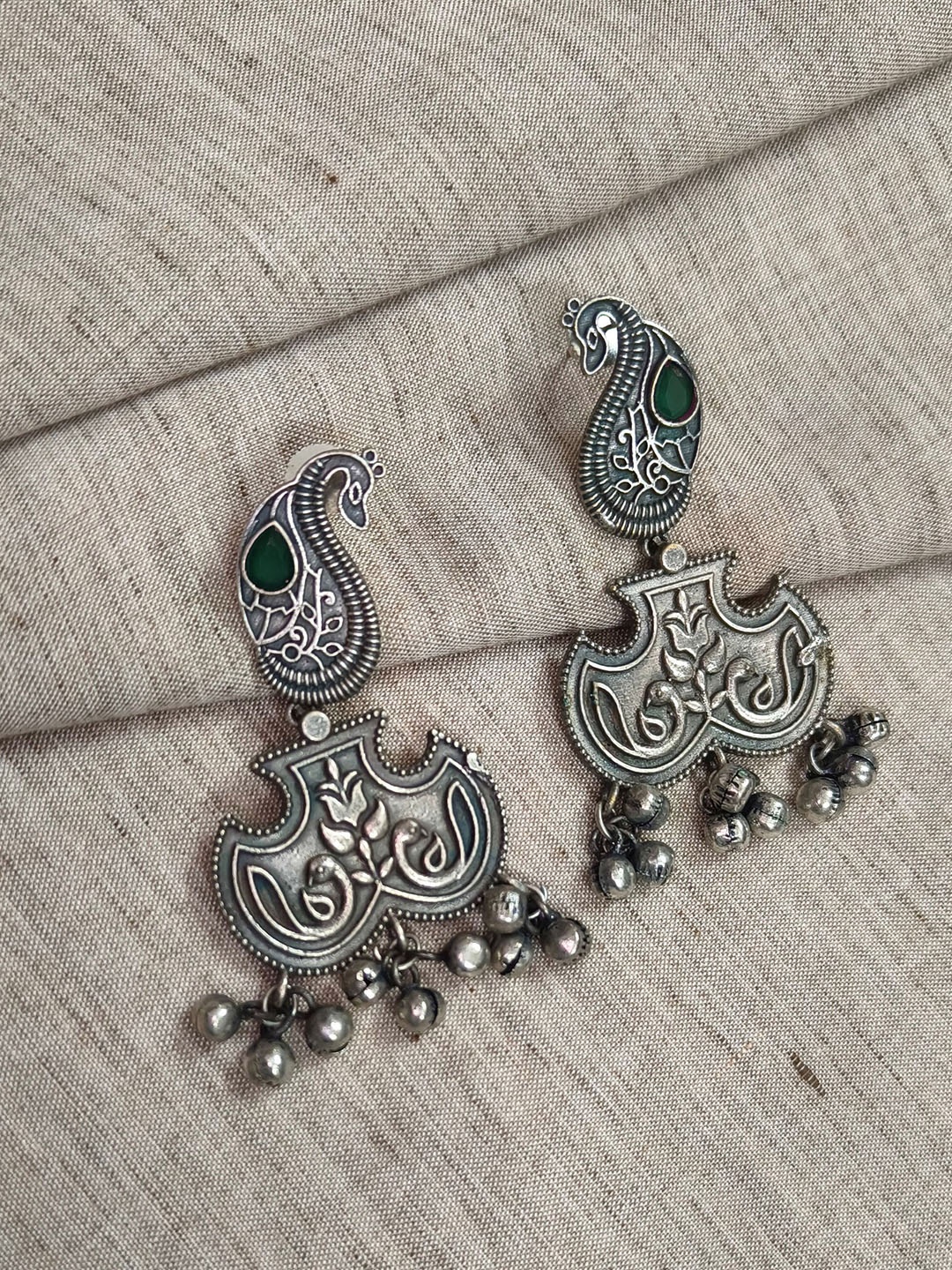 

Molcha Artificial Stones Studded Peacock Shaped Oxidised Drop Earrings, Silver