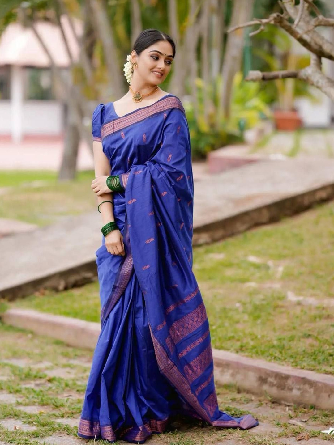 

APNISHA Woven Design Zari Pure Silk Banarasi Saree, Blue