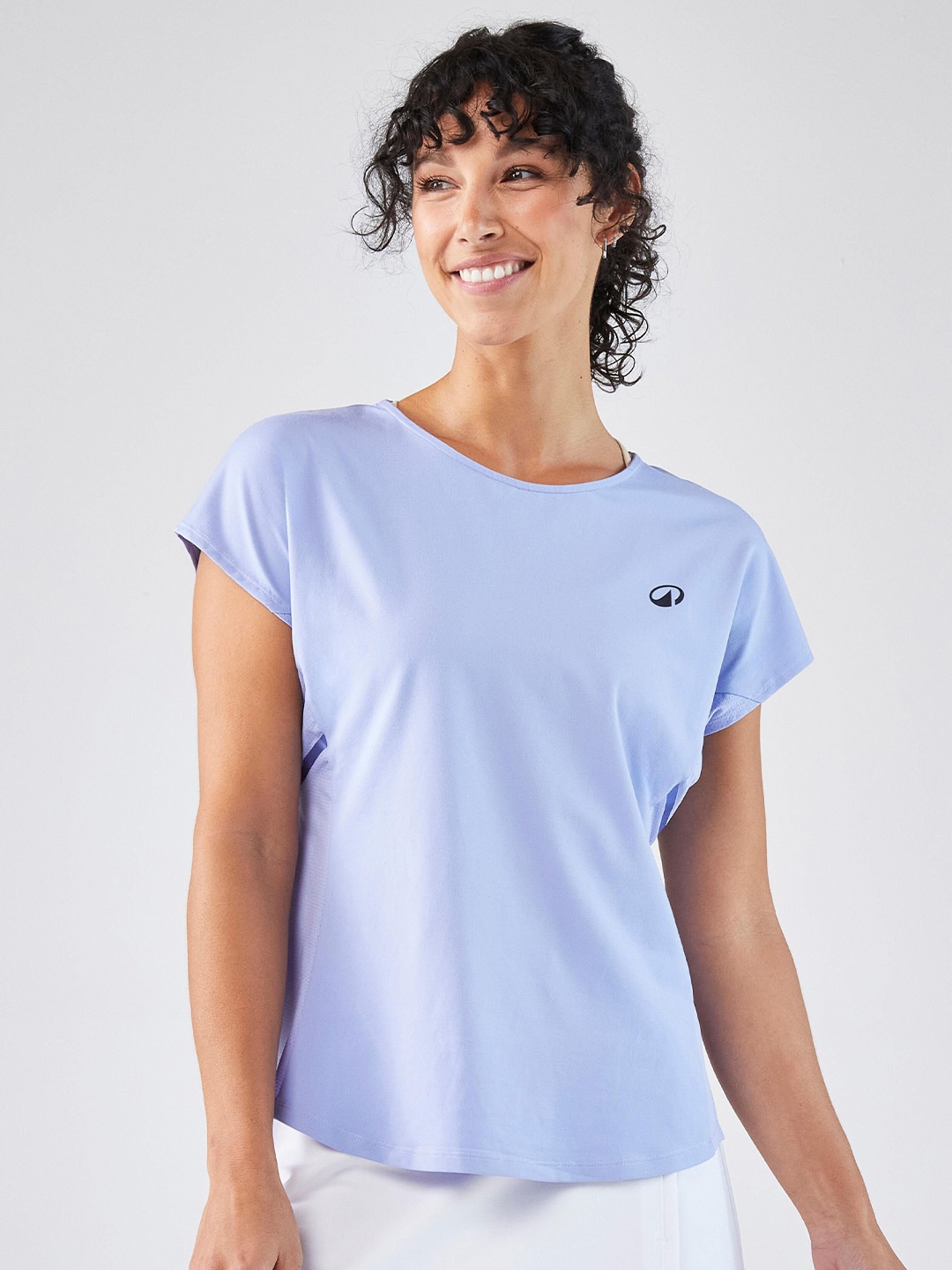 

Artengo By Decathlon Women Solid Round Neck T-shirt, Lavender