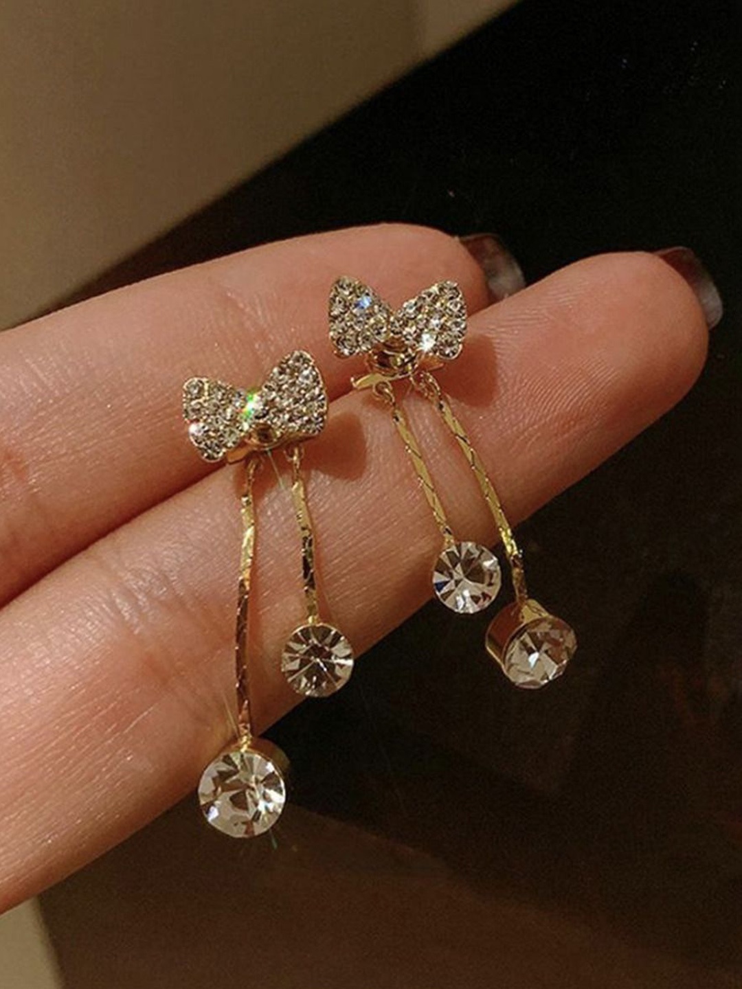

Celestique Artificial Stones Studded Bow Shaped Drop Earrings, Gold