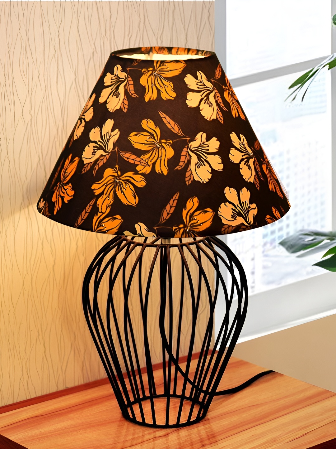 

Homesake Black Floral Printed Frustum Shaped Metal Table Lamp