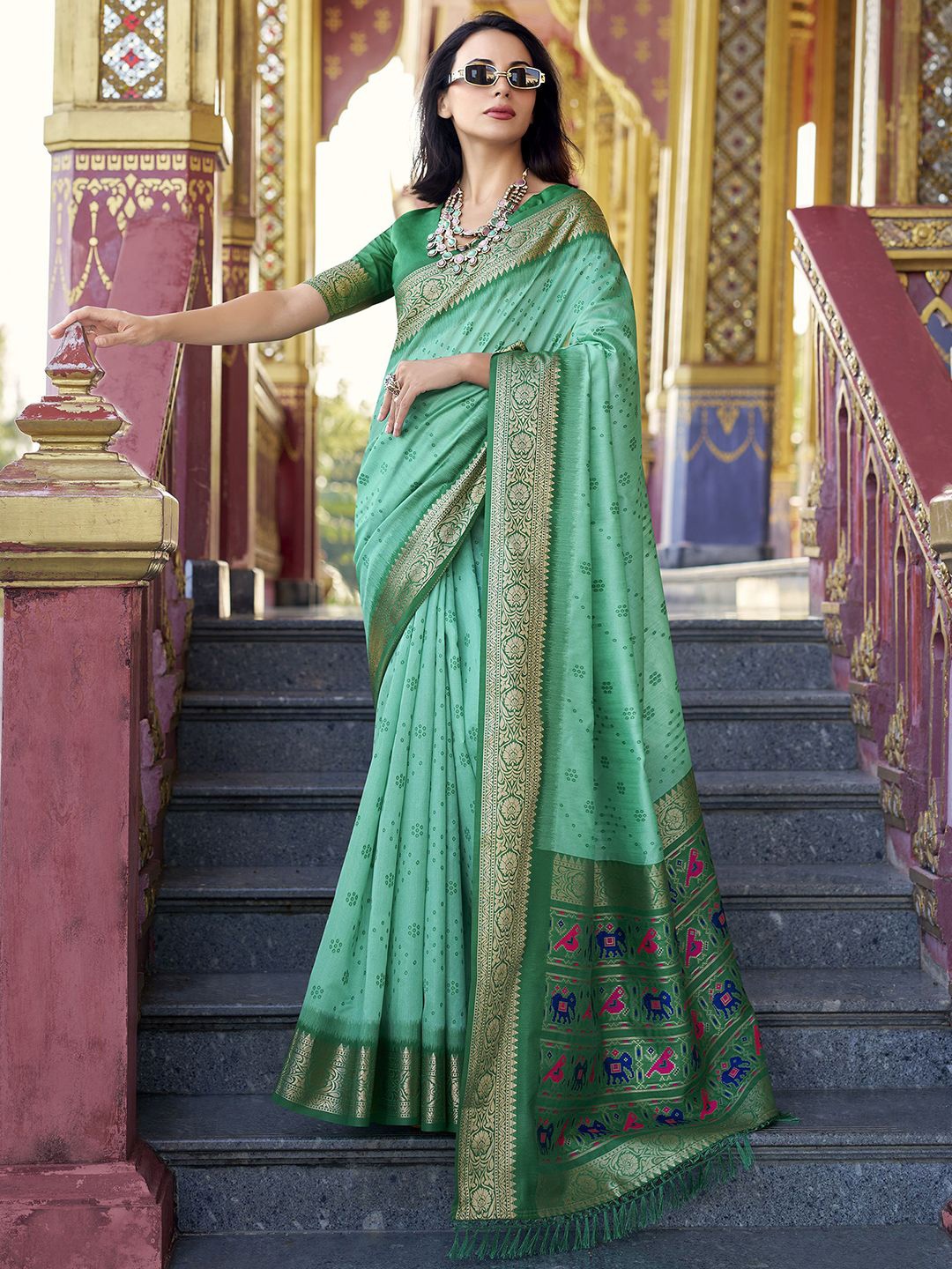 

Satrani Ethnic Motifs Woven Design Zari Patola Saree, Turquoise blue