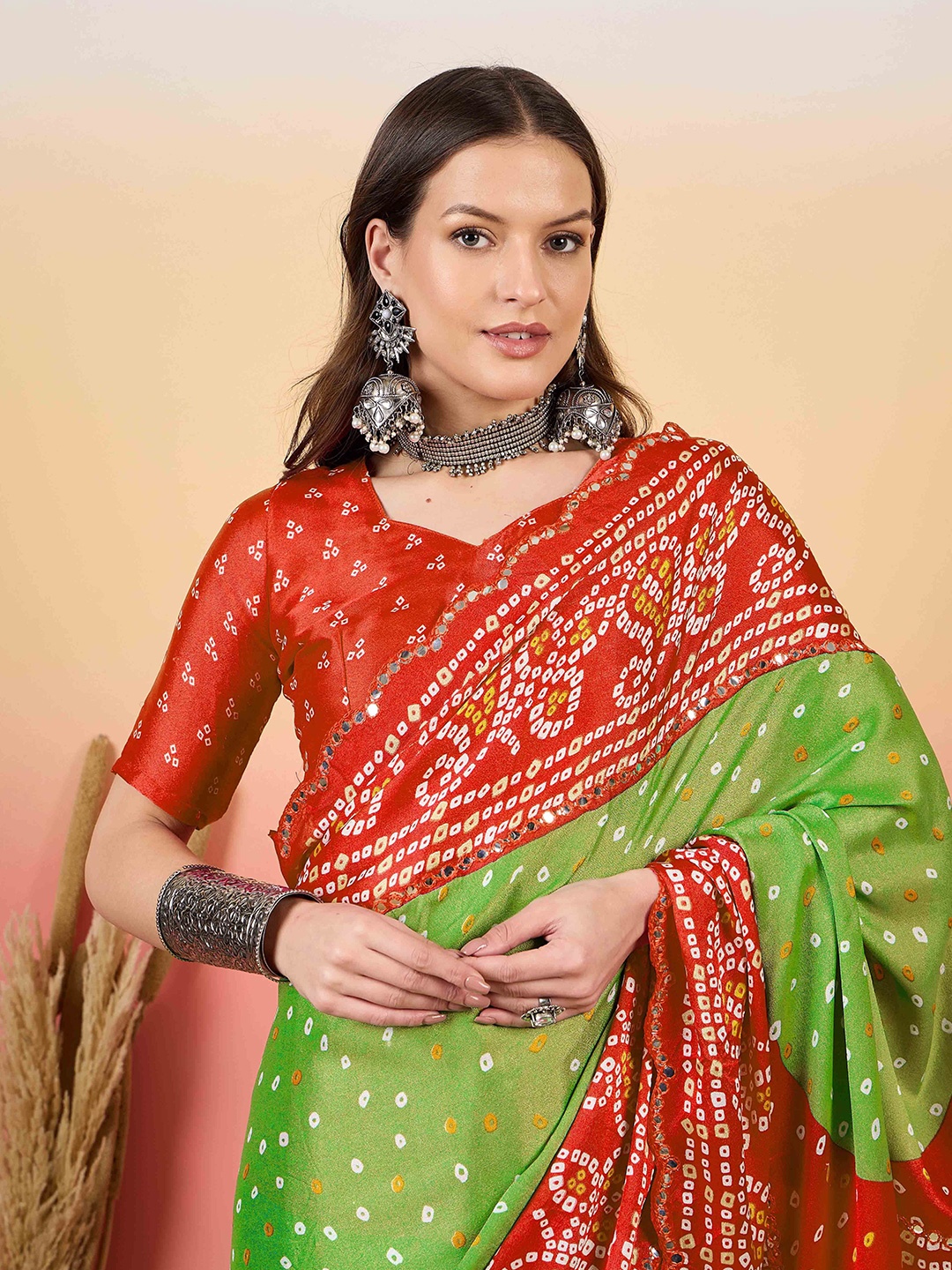 

Sangria Women Bandhini Printed Mirror Work Saree With Unstitched Blouse Piece, Red