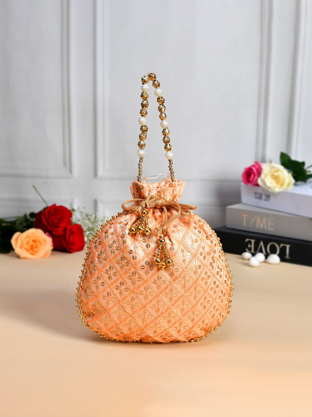 

Kuber Industries Embellished Silk Potli Clutch, Peach