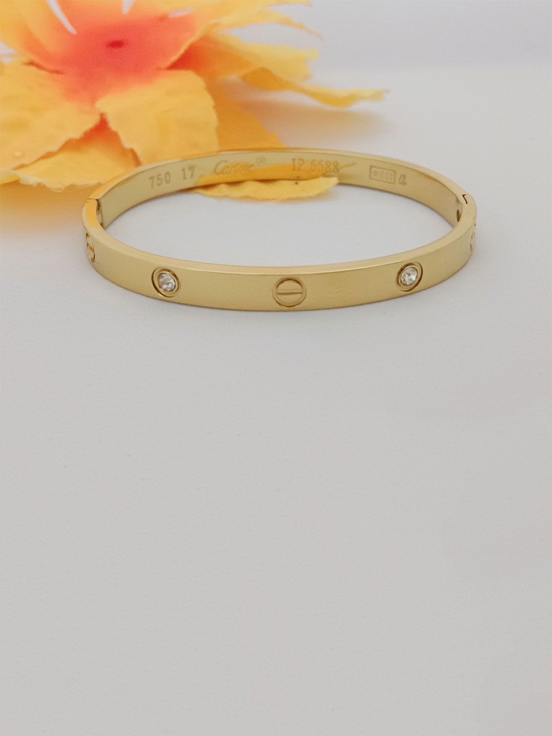 

EVY Korean Stainless Steel Gold-Plated Cubic Zirconia Adjustable Kada Bracelet