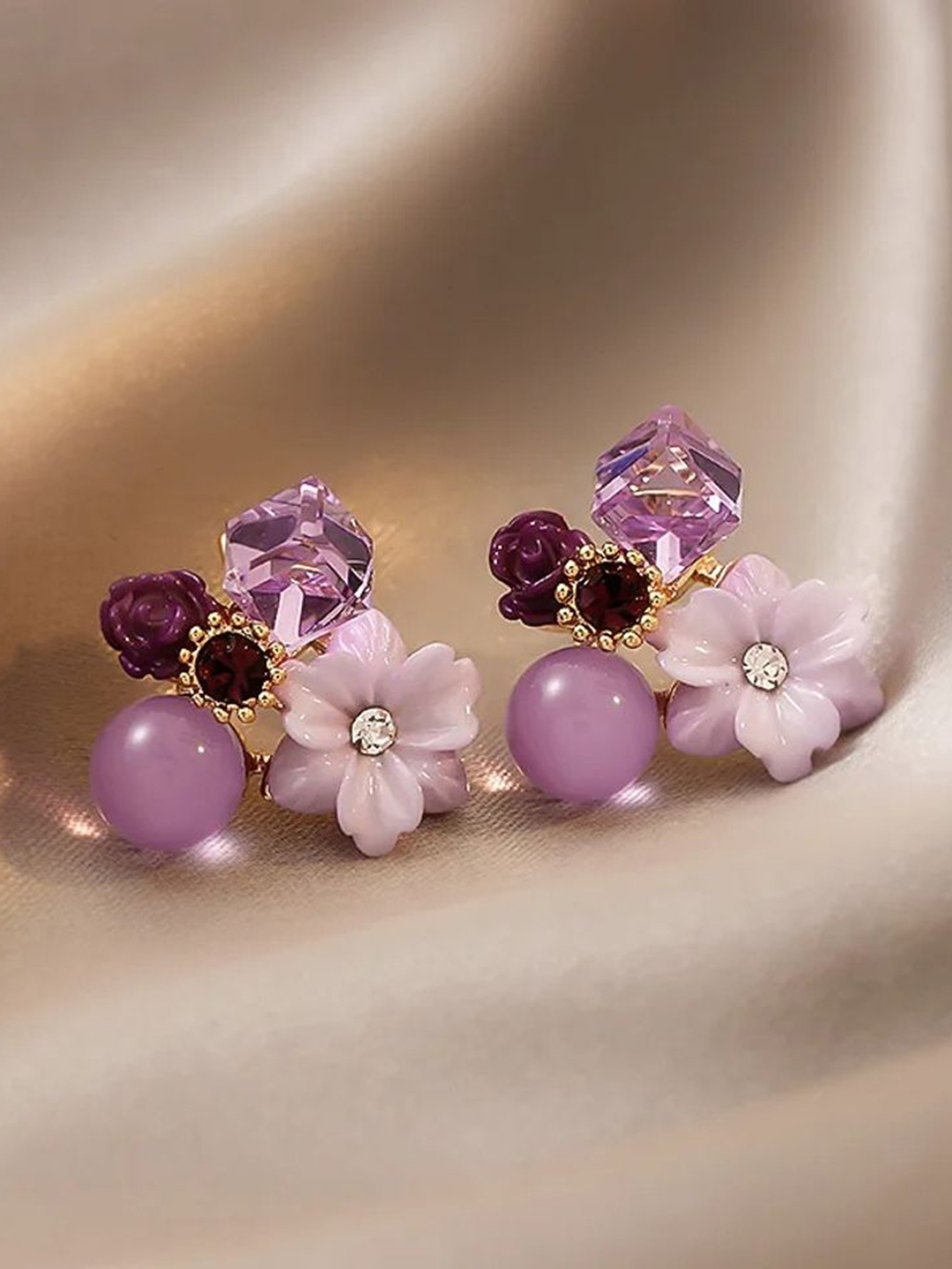 

Celestique Artificial Stones Studded Contemporary Shaped Studs, Purple