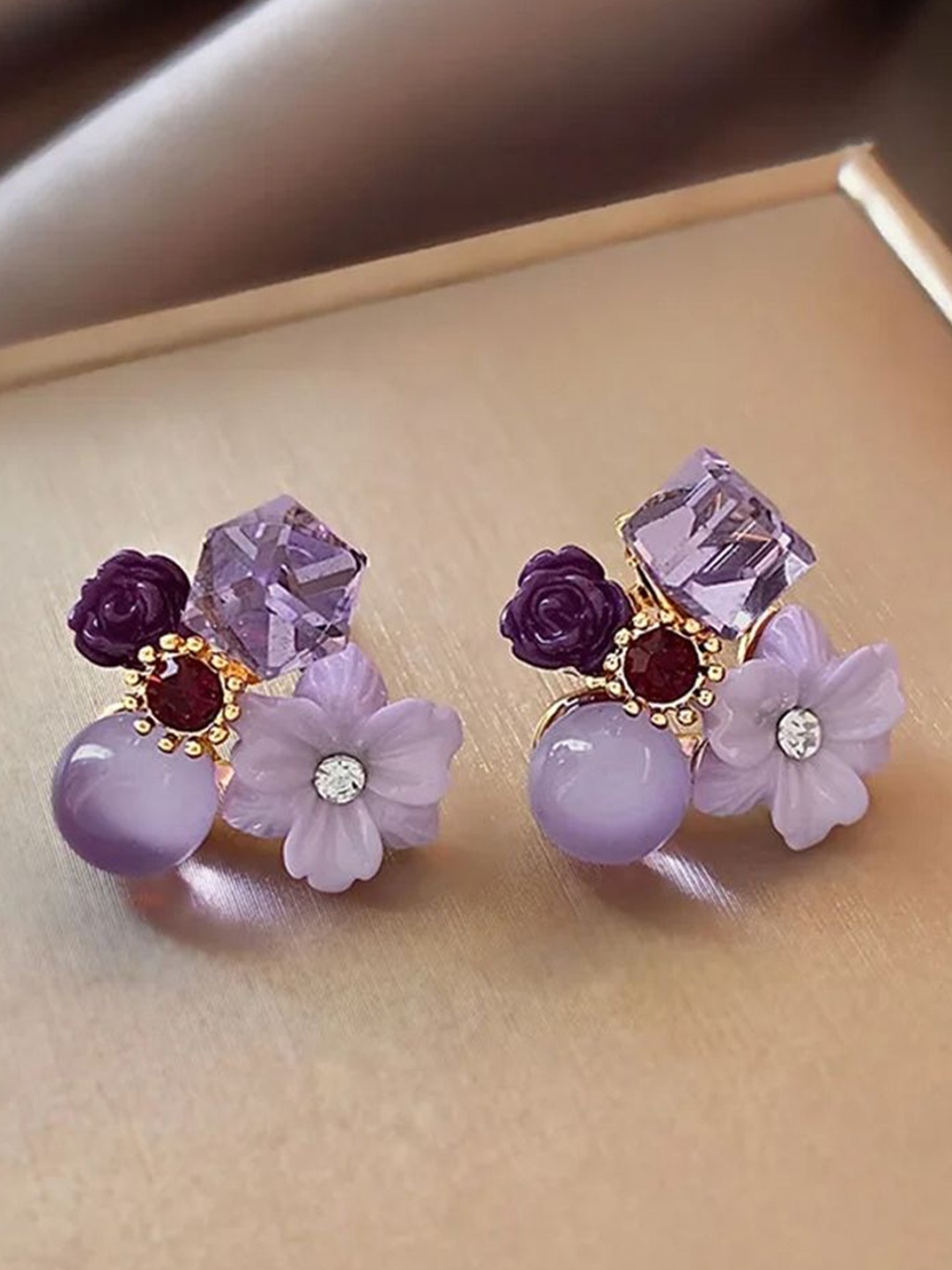 

Celestique Korean Artificial Stones Studded Contemporary Shaped Drop Earrings, Purple