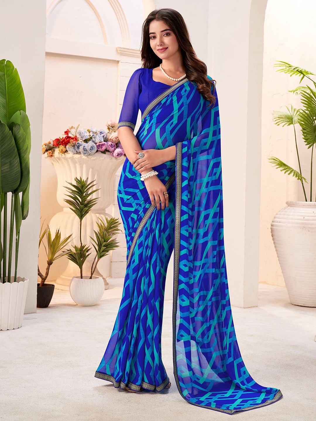 

Mitera Zari Printed Pure Georgette Saree, Navy blue