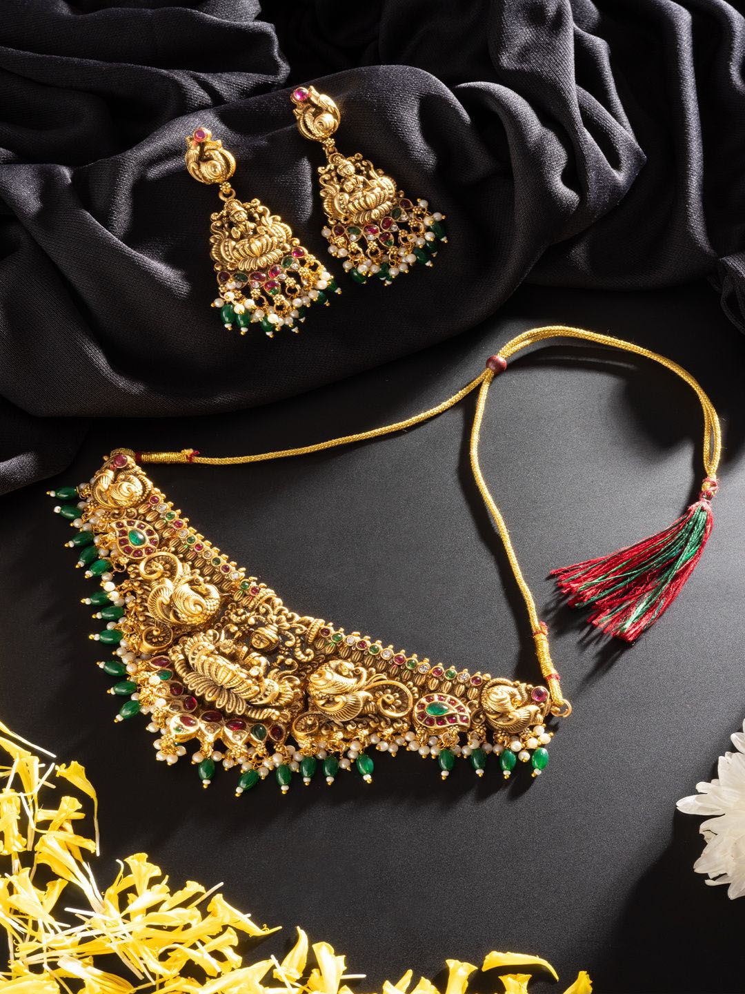 

Niscka Gold Plated American Diamond Studded & Beaded Temple Necklace And Earrings