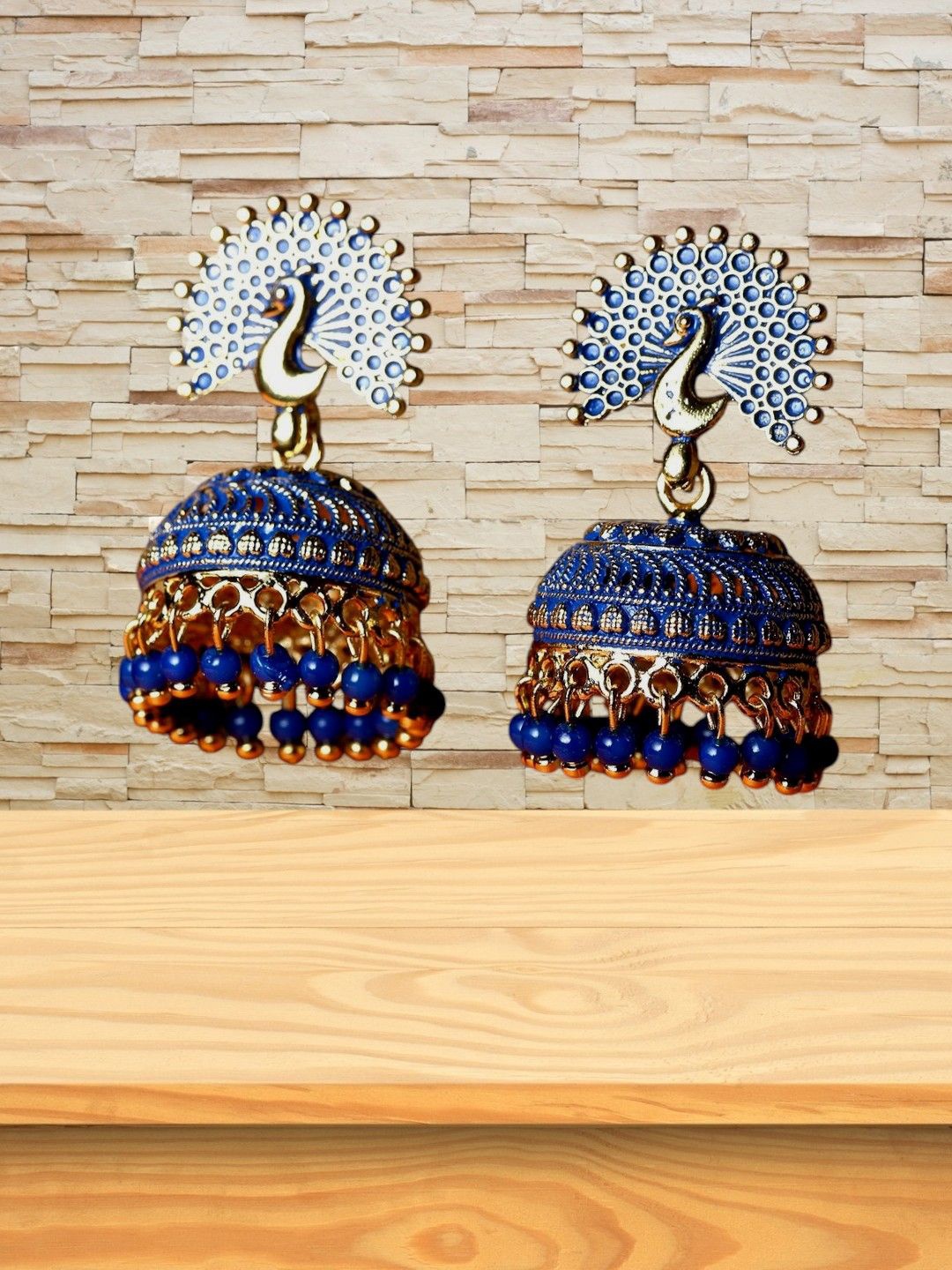 

Anouk Gold Plated Beaded Enamelled Dancing Peacock Dome Shaped Jhumkas, Blue