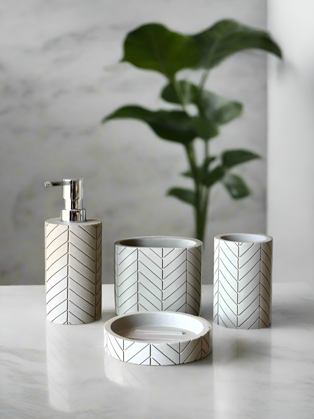 

Mason Home Aoraki White 4 Pieces Striped Polyresin Soap Dispensers