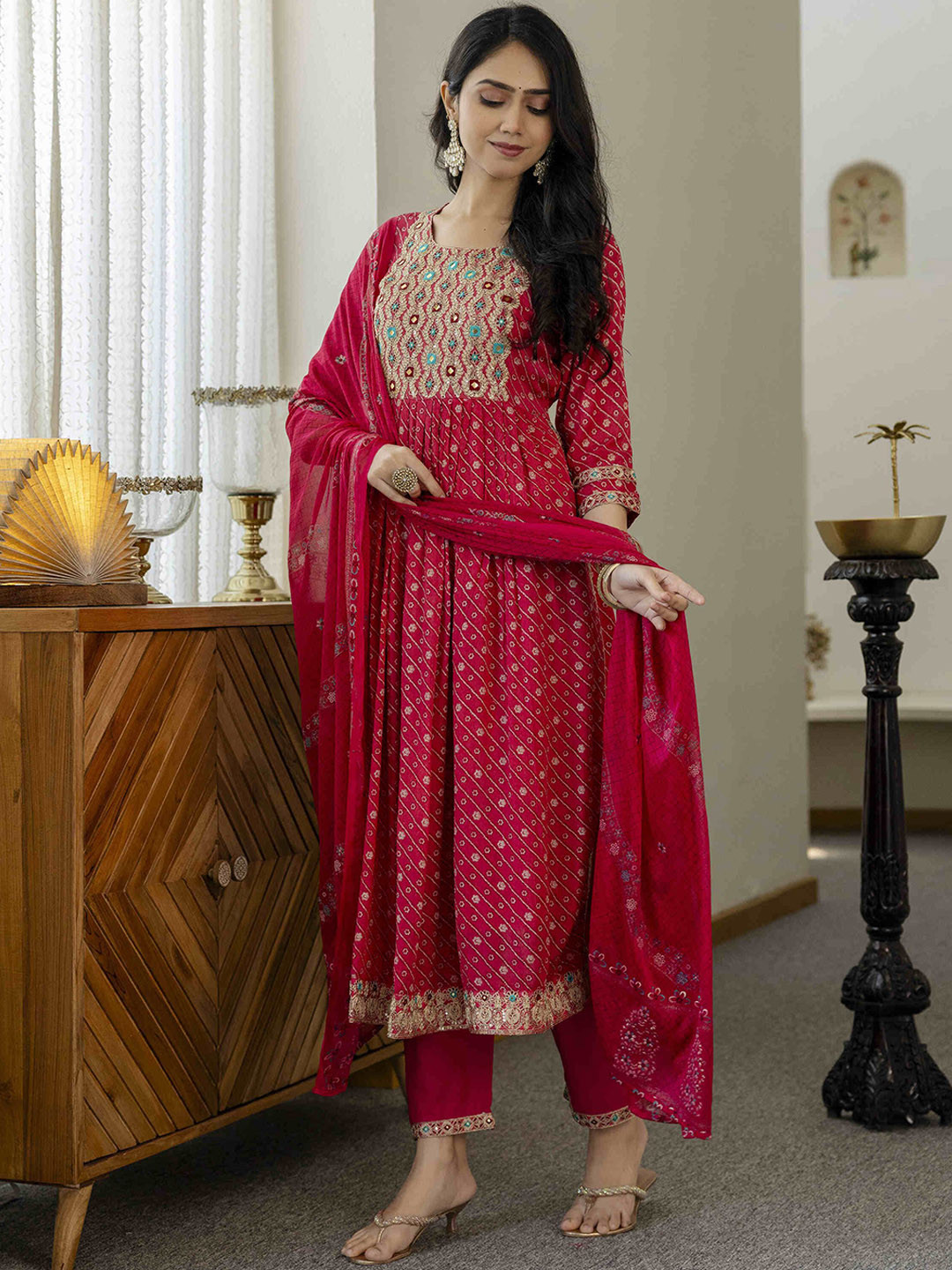 

Gauric creation Floral Printed Embroidered Zari A-Line Kurta With Trousers And Dupatta, Pink