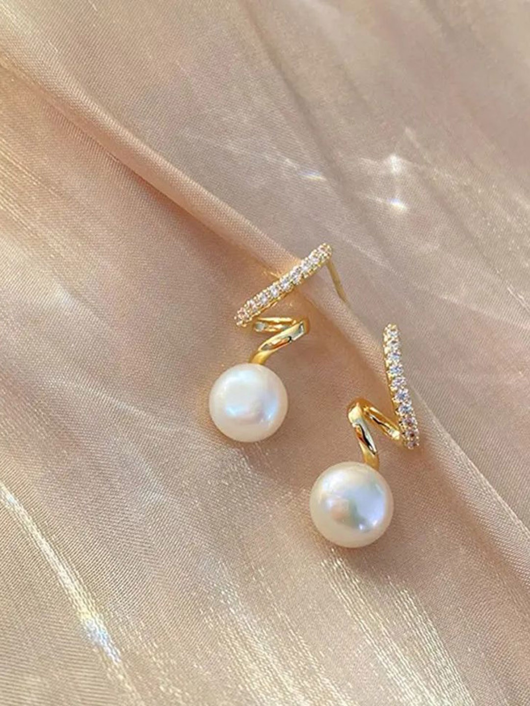 

Celestique Korean Pearls Studded Contemporary Shaped DropEarrings, Gold
