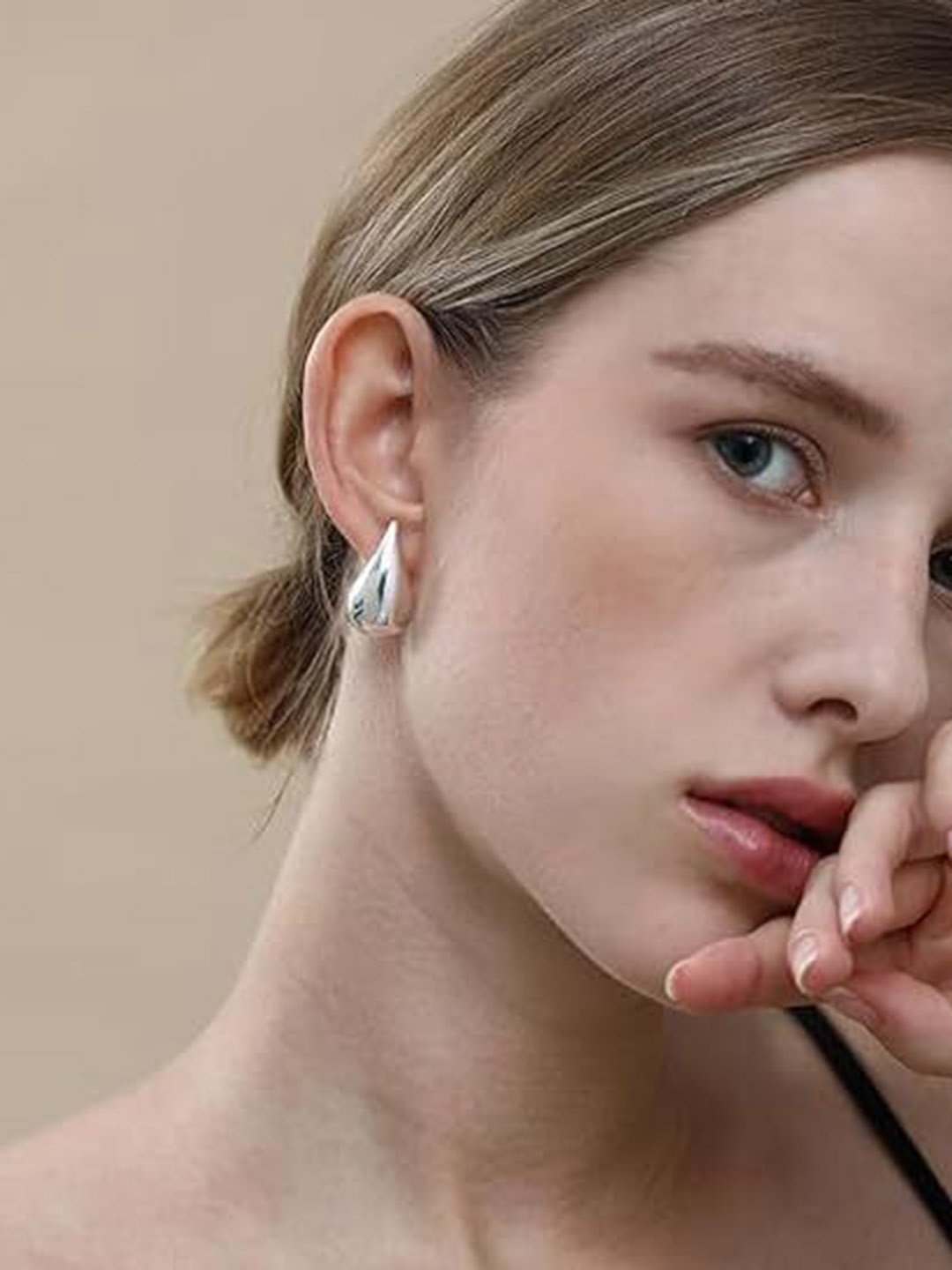 

Celestique Silver-Plated Teardrop Shaped Drop Earrings