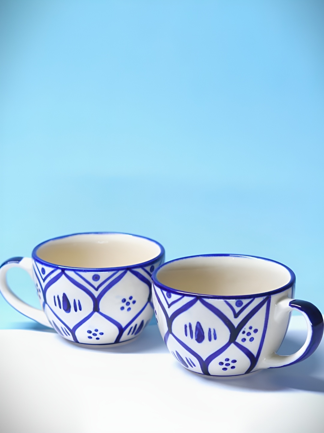 

Rare Planet White & Blue 2 Pieces Mughal Art Design Ceramic Glossy Cups