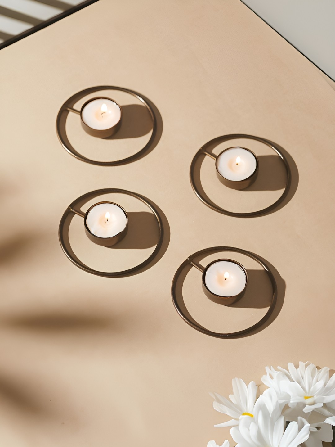 

Homspurts Copper Toned 4 Pieces Metal Candle Holders