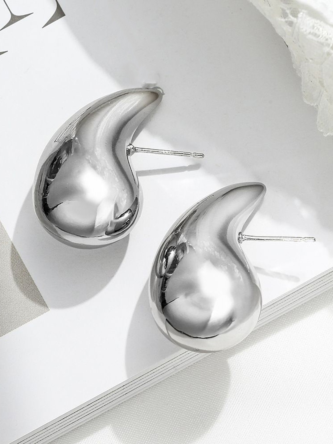 

Celestique Silver-Plated Teardrop Shaped Drop Earrings
