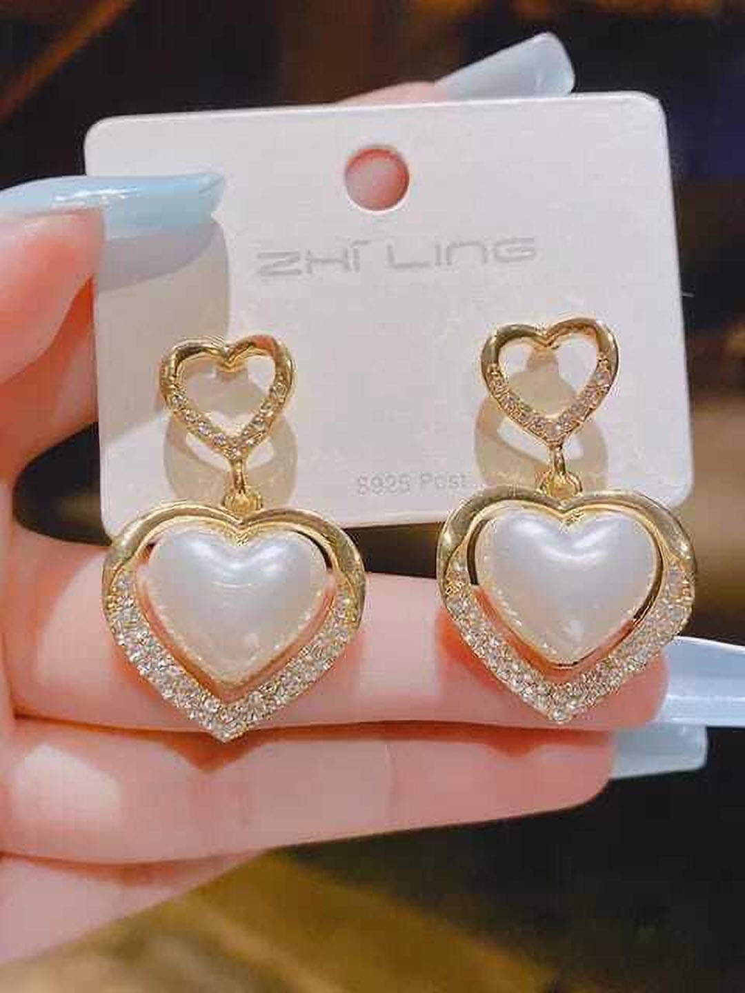 

Celestique Gold-Plated Artificial Stones And Beaded Contemporary Shaped Drop Earrings