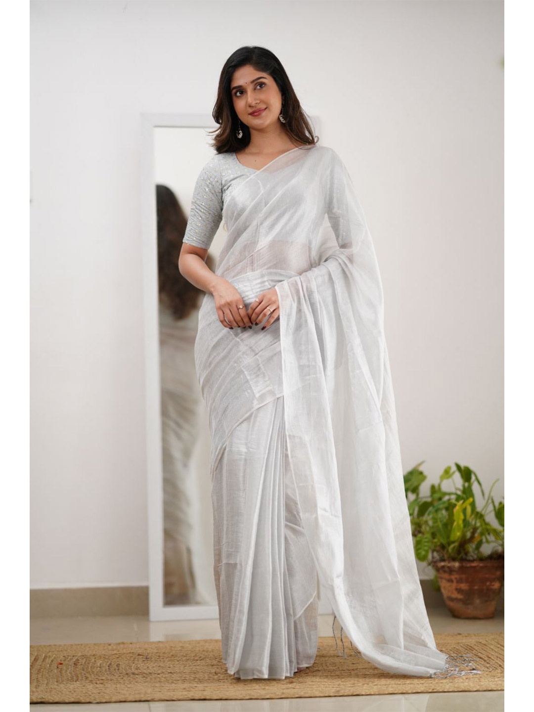 

Sutisancha White Handloom Tissue Saree With Designer Blouse