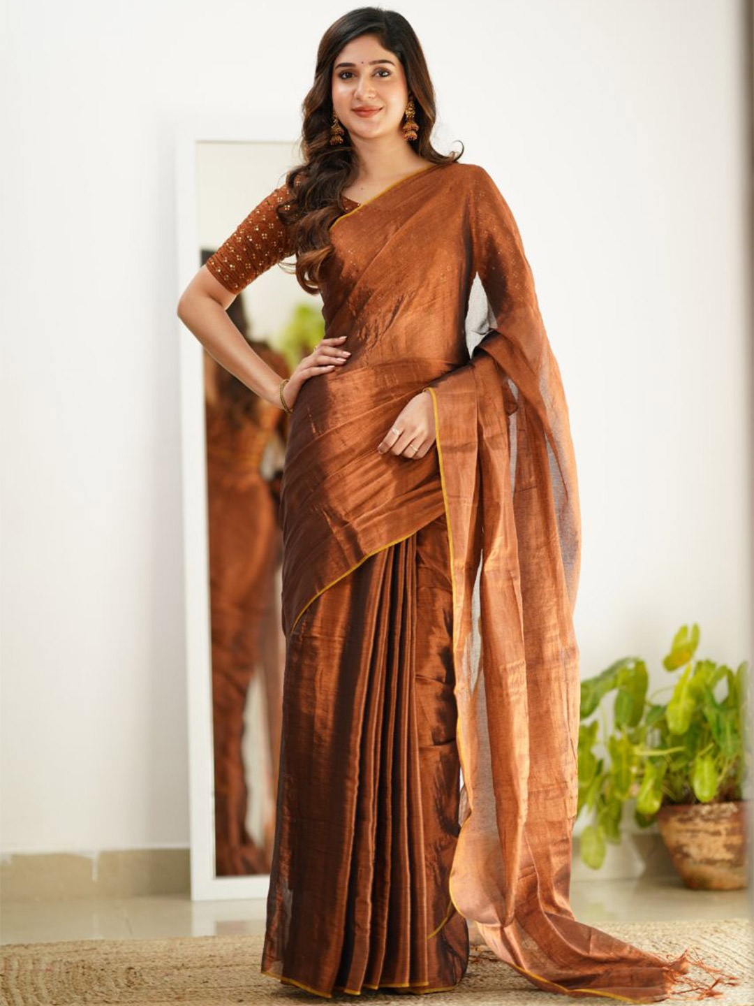 

Sutisancha Copper Handloom Tissue Saree With Designer Blouse