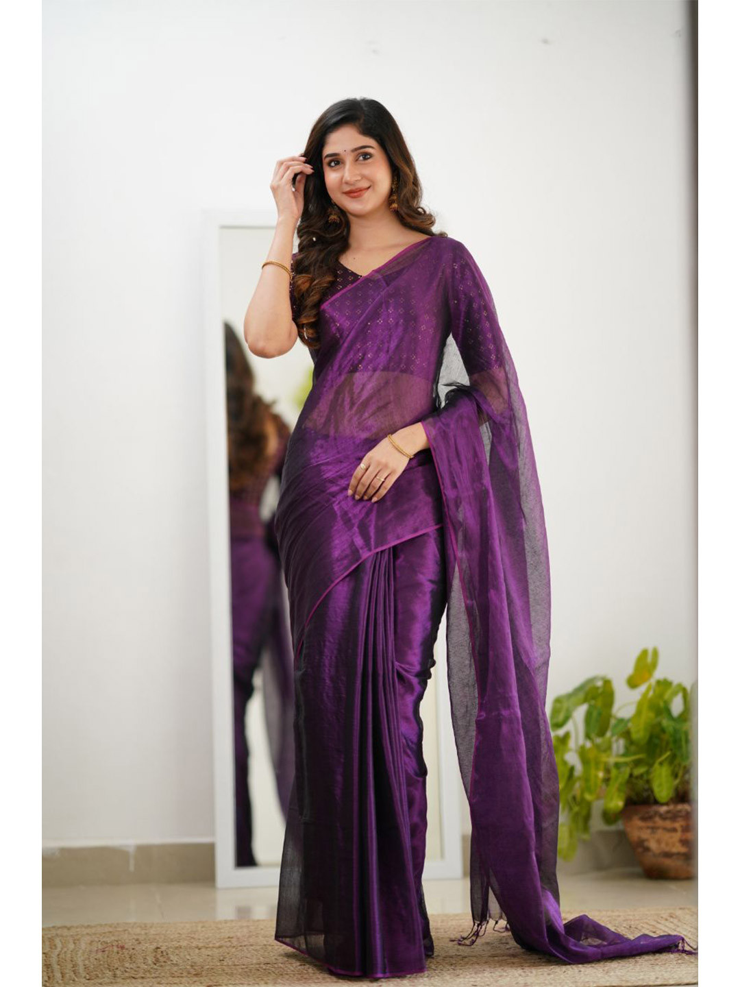 

Sutisancha Purple Handloom Tissue Saree With Designer Blouse