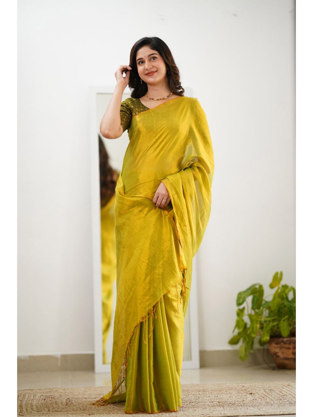 

Sutisancha Lime Green Handloom Tissue Saree With Designer Blouse