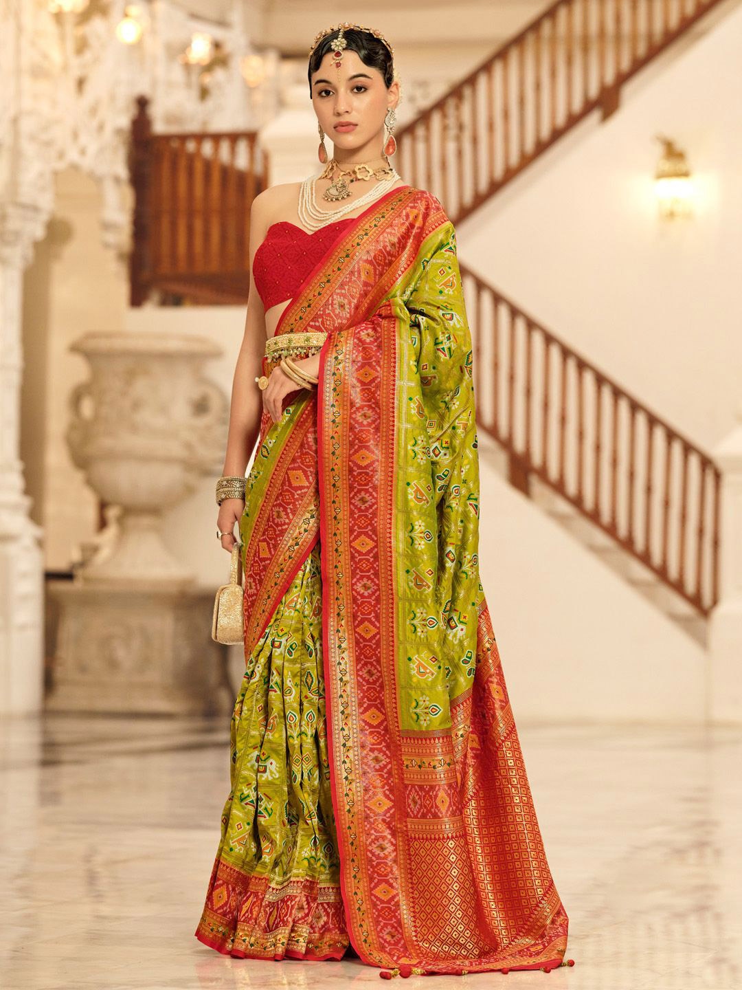 

Anouk Woven Design Zari Patola Saree, Green