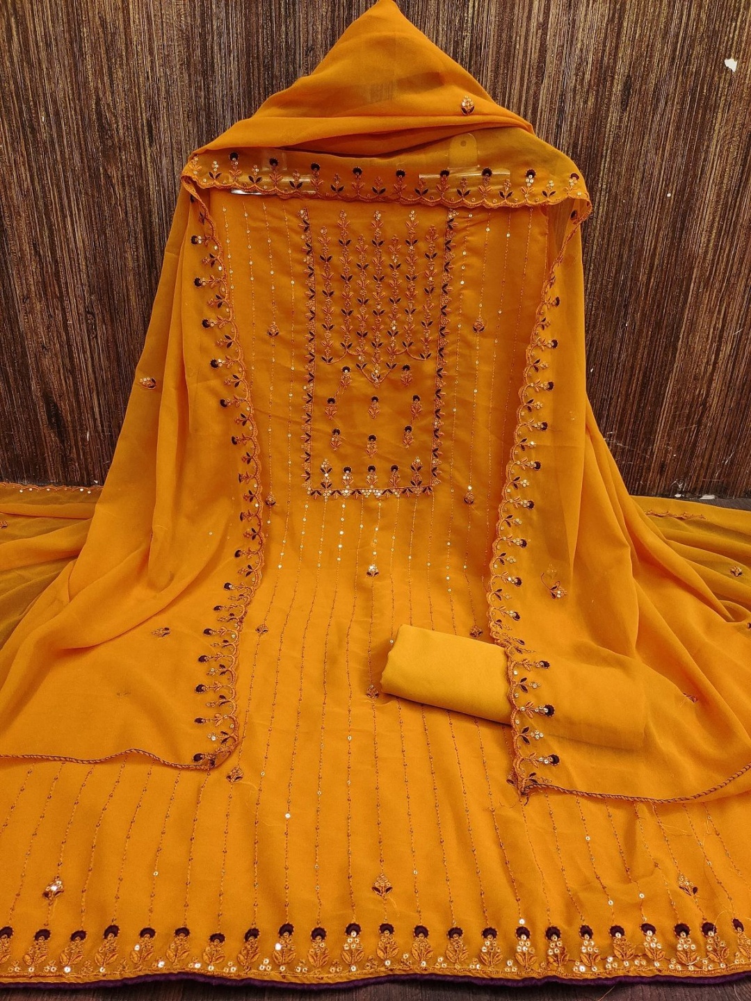

Aika Ethnic Motifs Sequence Silk Georgette Unstitched Dress Material, Mustard