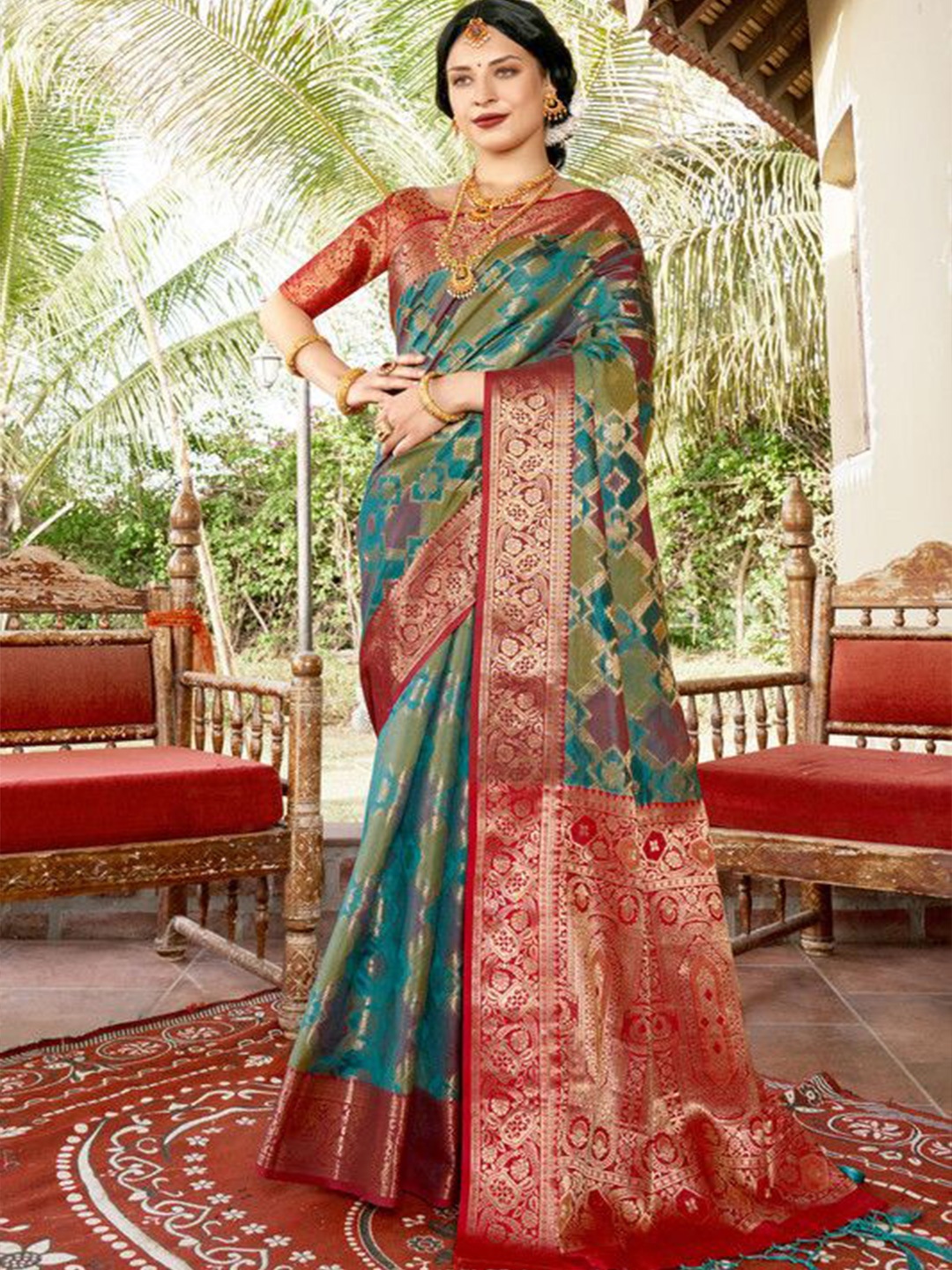 

sagarika Woven Design Patola Saree, Turquoise blue