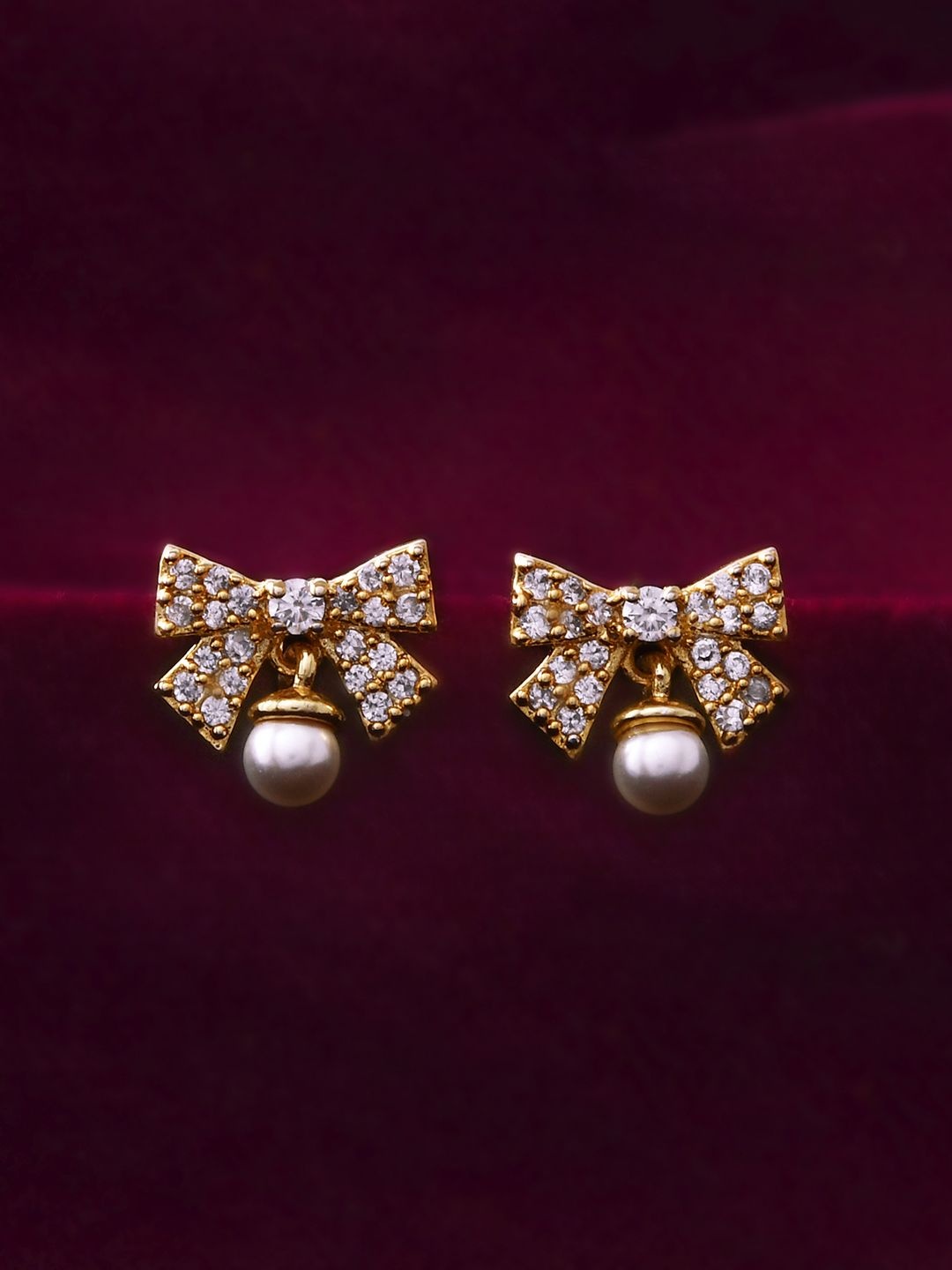 

Voylla Trendy Adore Me Gold-Plated American Diamond Brass Contemporary Studs