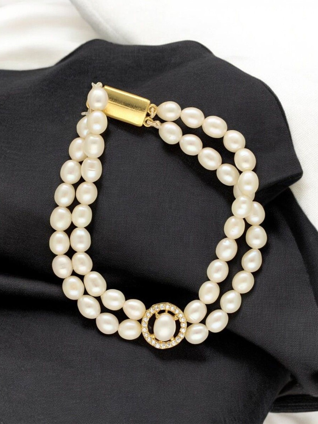 

Sri Jagdamba Pearls Dealer Gold-Plated Beaded Multistrand Bracelet