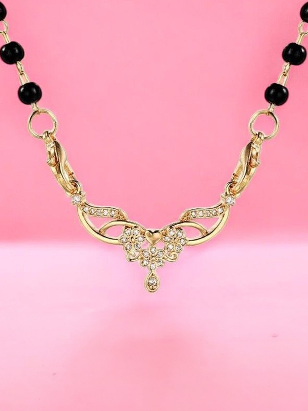 

Nilu's Collection Gold-Plated Stone Studded & Beaded Mangalsutra