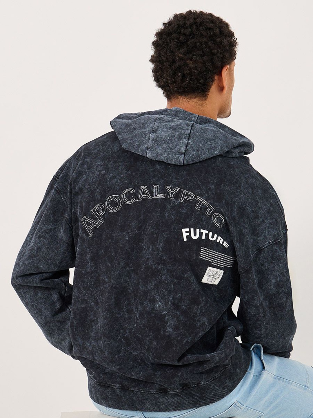 

Styli Men Acid Washed Oversized Hoodie With Back Applique And Badge Details, Charcoal