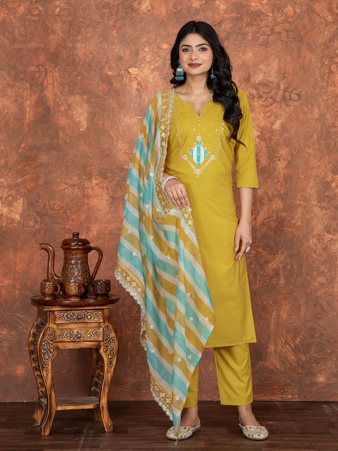 

Siya Fashion Floral Embroidered Sequinned Notch Neck Kurta With Trouser And Dupatta, Yellow