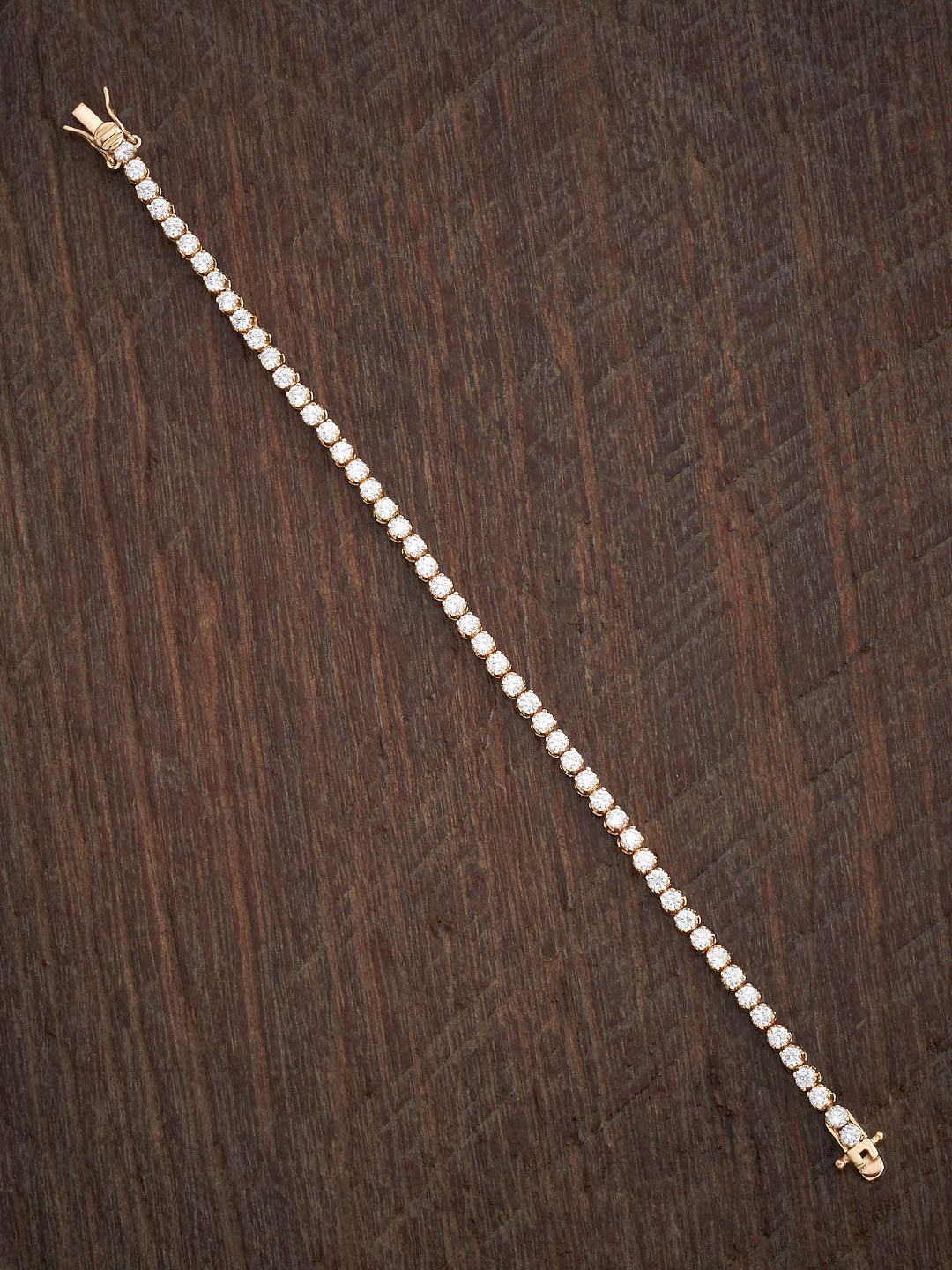 

Kushal's Fashion Jewellery Women Gold-Plated Cubic Zirconia Stone Studded Link Bracelet