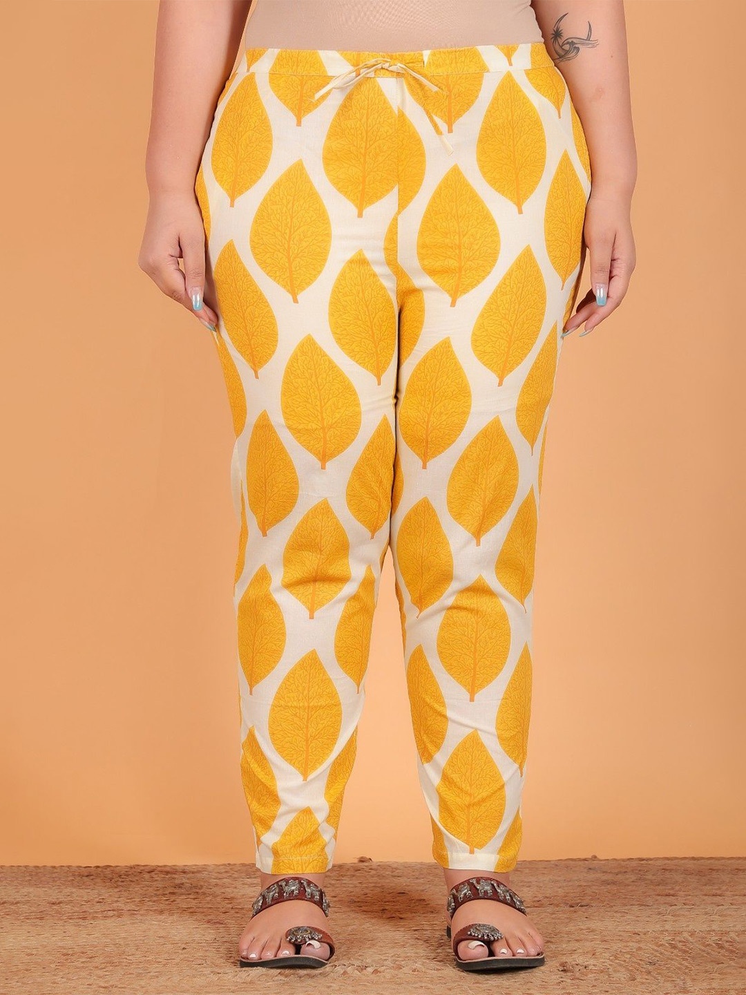 

Aramya Women Plus size Printed Regular Fit Mid-Rise Trousers, Yellow