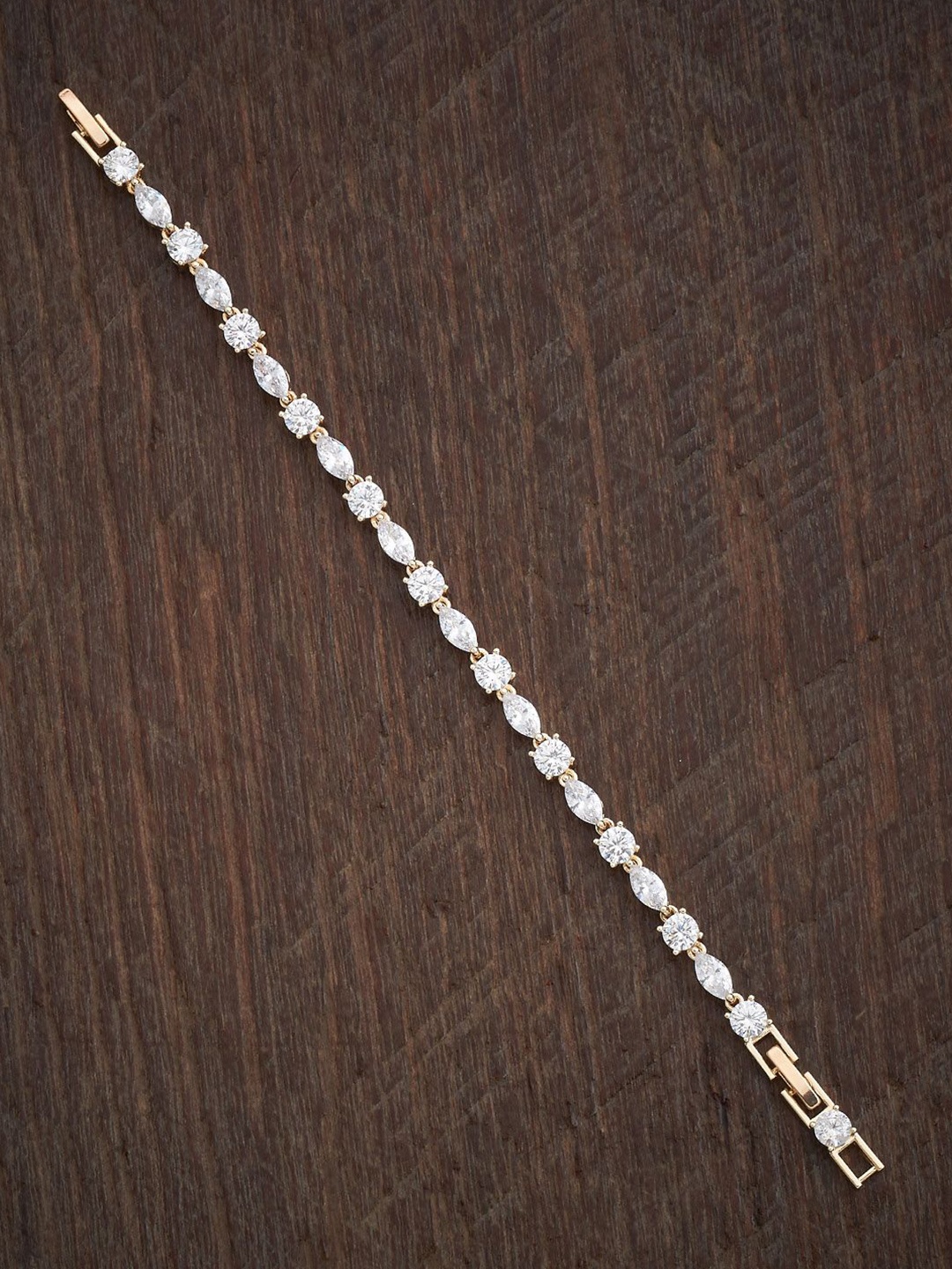 

Kushal's Fashion Jewellery Women Gold-Plated Cubic Zirconia Studded Link Bracelet