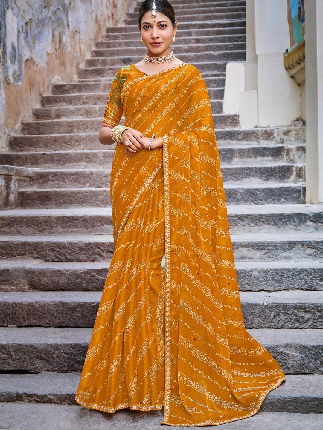 

Laxmipati Bandhani Poly Chiffon Designer Saree, Mustard