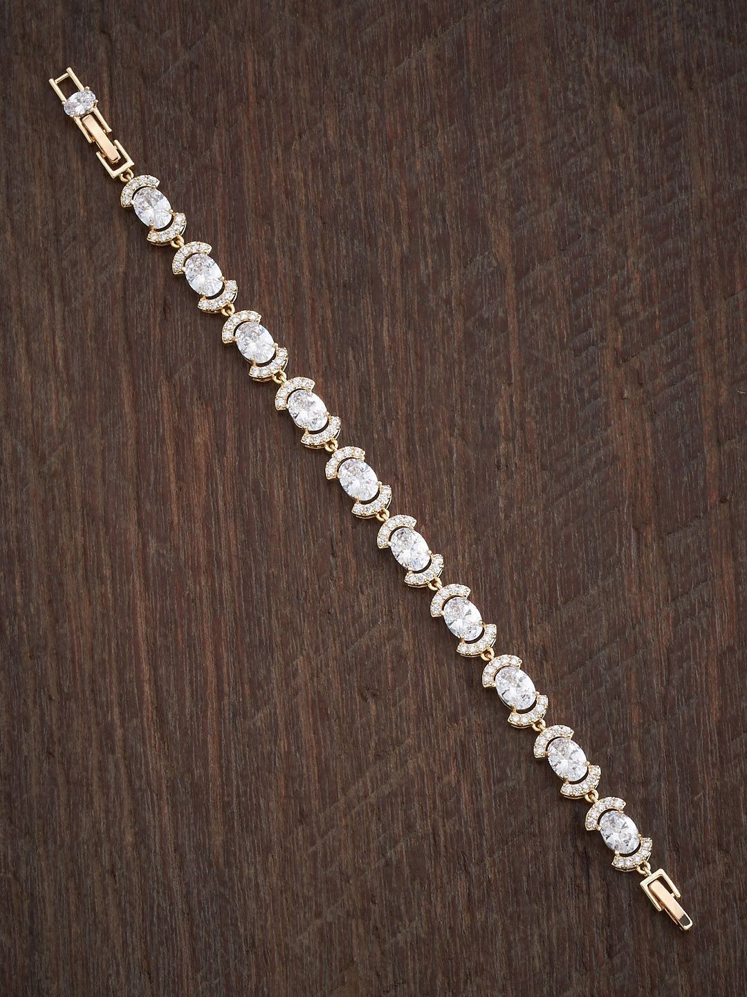 

Kushal's Fashion Jewellery Cubic Zirconia Gold-Plated Link Bracelet