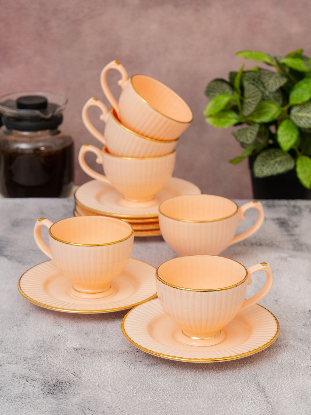 

CLAY CRAFT Peach Set Of 12 Floral Printed Ceramic Glossy Cup & Saucer 170 ml each