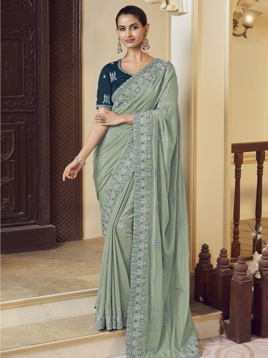 

Suha Embellished Pure Georgette Saree, Green