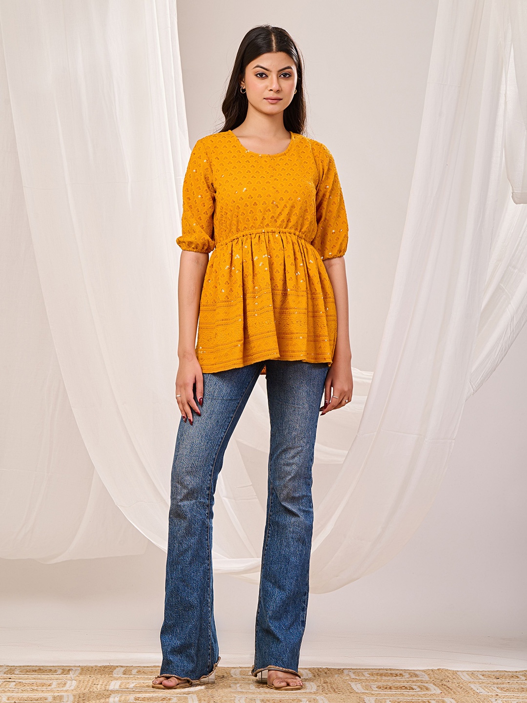 

Futra Gabha Women Embroidered Longline Top, Mustard