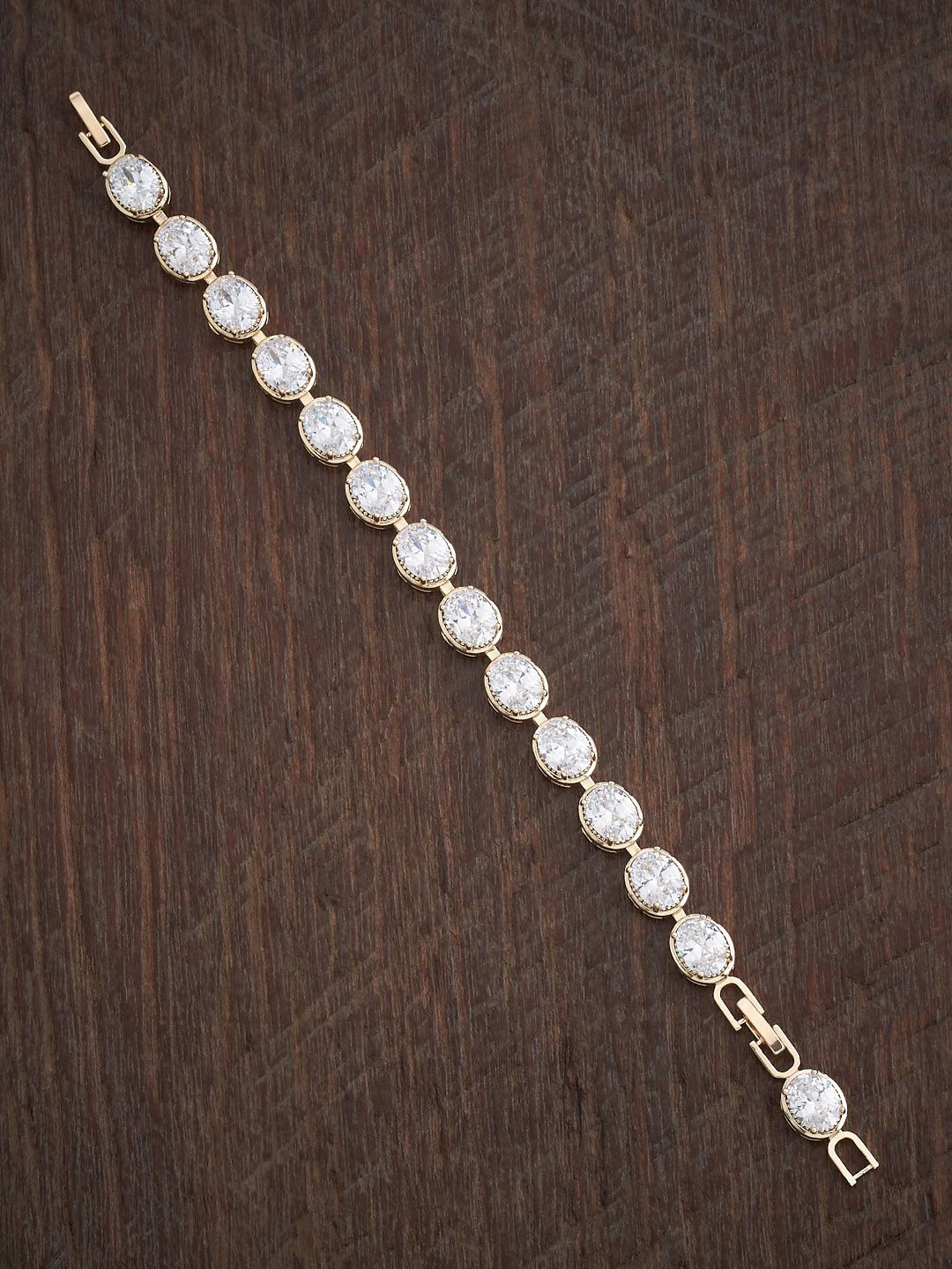 

Kushal's Fashion Jewellery Women Gold-Plated Cubic Zirconia Studded Link Bracelet