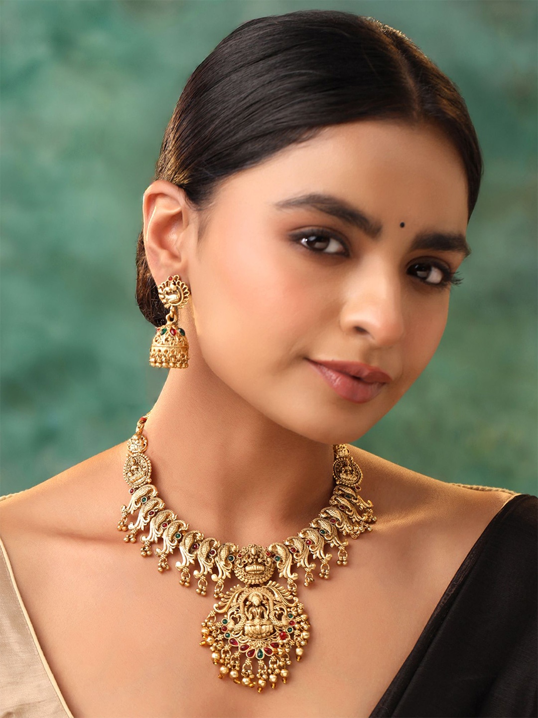 

Yellow Chimes Gold-Plated Artificial Stone-Studded & Beaded Temple Jewellery Set