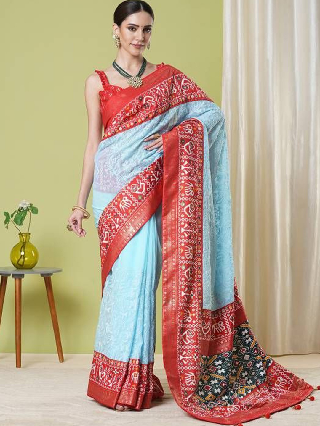 

KAYOMMI Ethnic Motifs Embroidered Pure Georgette Patola Saree, Blue
