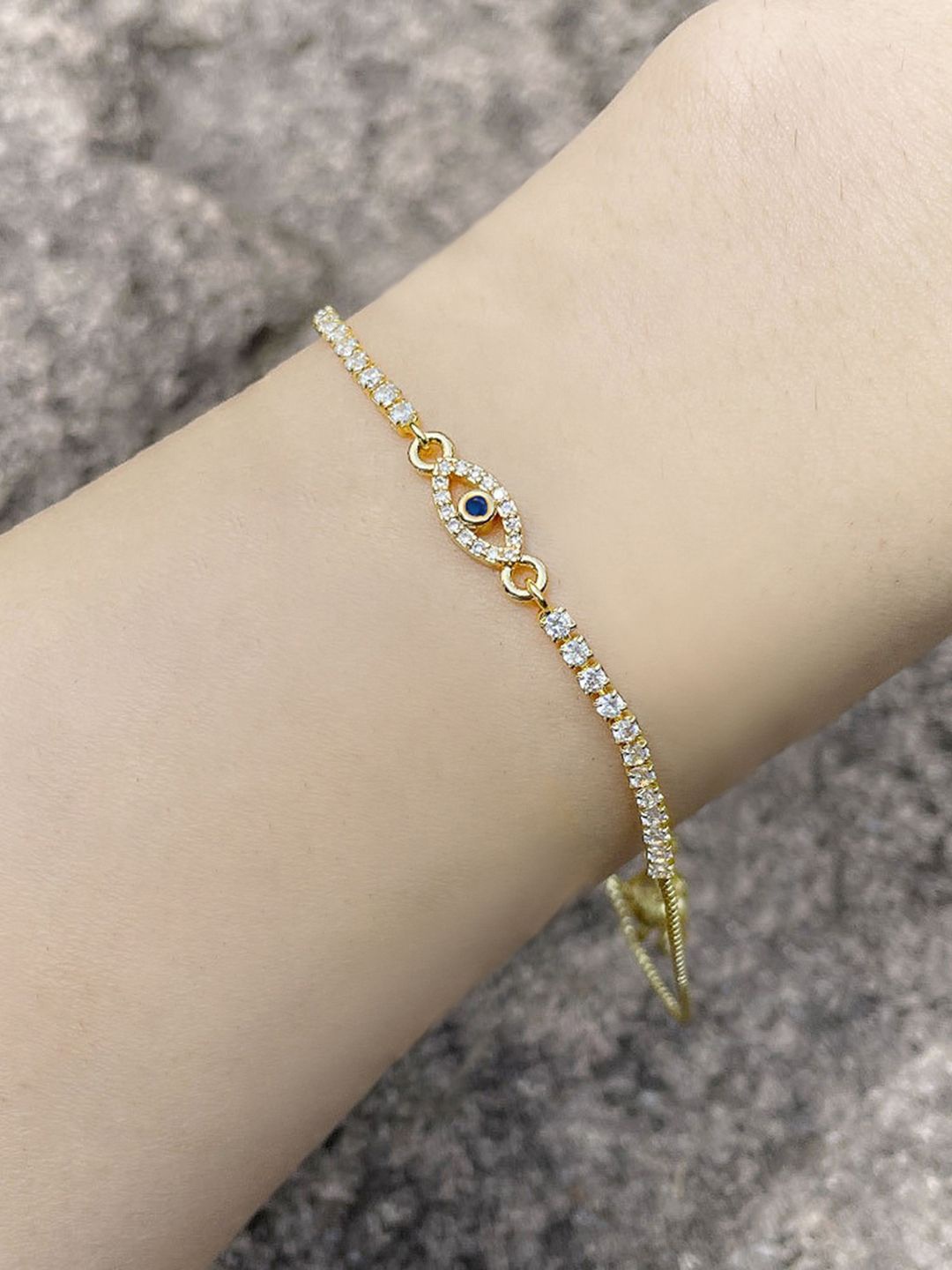 

Peora Gold-Plated Cubic Zirconia Studded Evil Eye Adjustable Wraparound Bracelet