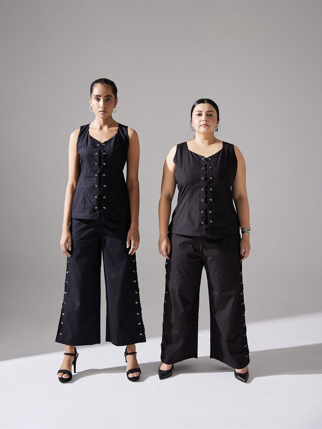 

Aamili Women Solid Top & Trousers Co-Ord Set, Black