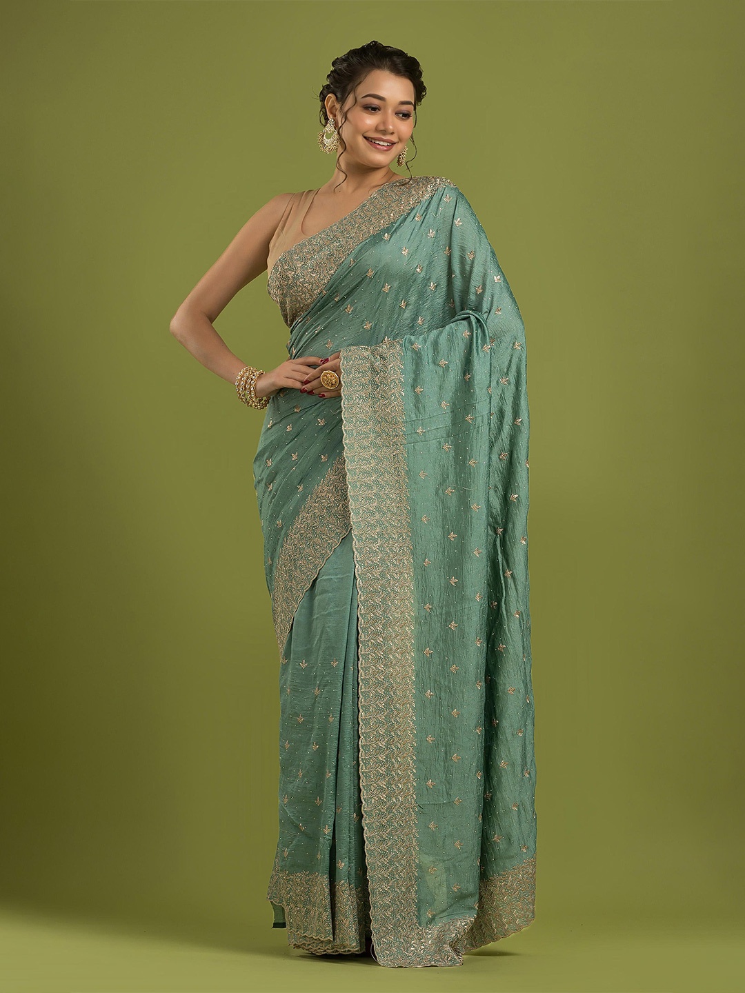 

Dheu Embroidered Sequinned Pure Georgette Saree, Green